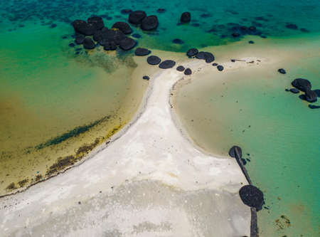 Beautiful tropical island koh Kham, white sand beach with volcanic rocks, near koh Mak, Trat,...