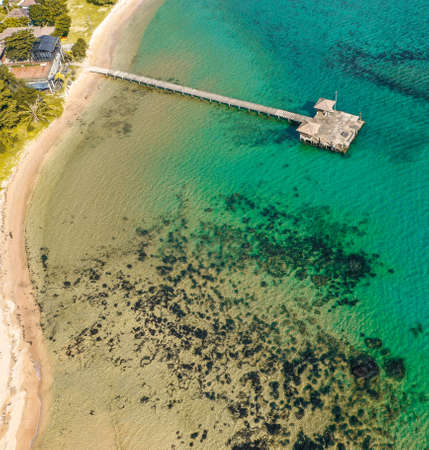 Koh Mak tropical island and its long wooden pier on the sea, near koh Chang, Trat, Thailandの写真素材