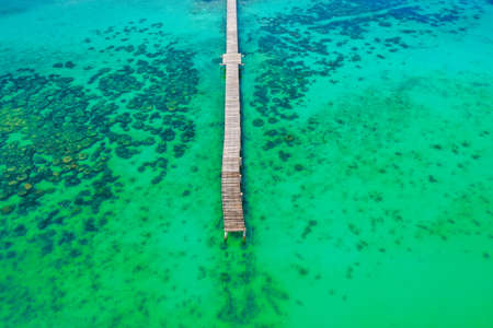 Beautiful tropical island koh Kham, white sand beach with volcanic rocks, near koh Mak, Trat, Thailandの写真素材
