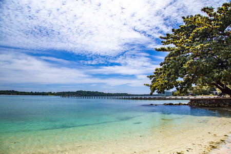 Beautiful tropical island koh Kham, white sand beach with volcanic rocks, near koh Mak, Trat,...