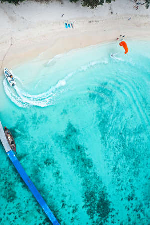Coral island, koh He, beach and boats in Phuket province, Thailand