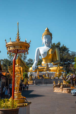 Wat Phrathat Doi Kham, Buddha pagoda and golden chedi in Chiang Mai, Thailandの写真素材