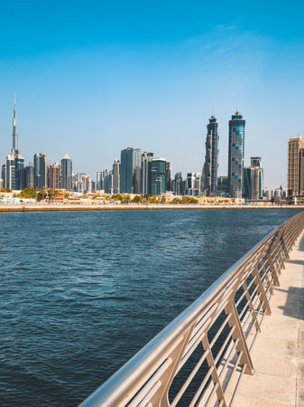 Dubai Water Canal Tolerance Bridge, pedestrian bridge with water taxi, in Dubai, UAEの写真素材