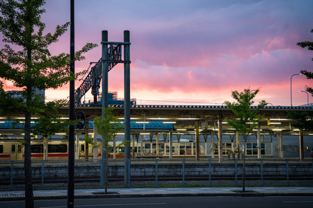 Aomori street and train station at sunset, in Japanの写真素材