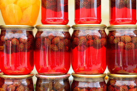 jars of jam. Jam made from cones. Georgian tourism market souvenirs.の写真素材