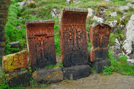 Armenian khachkars. Unique tombstones of volcanic tuff. Armenian attraction.