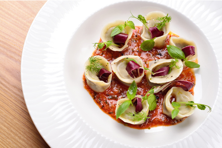 tortellini with mushrooms, and basil sauce, Italian foodの写真素材