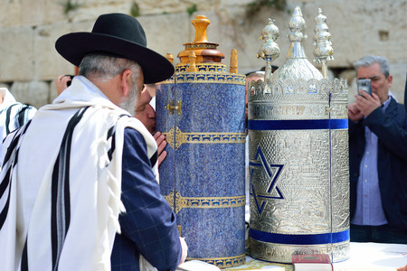 JERUSALEM, ISRAEL - APRIL 2017:  Jewish man celebrate Simchat Torah. Simchat Torah is a celebratory Jewish holiday marks the completion of the annual Torah reading cycleのeditorial素材