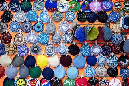 JERUSALEM, ISRAEL - APRIL 2017: Kippahs Yarmulkes Jewish Hats Covers Israeli Star of David Souvenirs Safed Tsefat Israel. Kippahs. Jewish headgear worn by men during a Jewish. Required by Judaisim.のeditorial素材