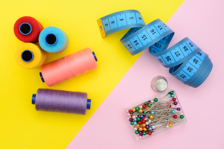 tool kit for cutting, sewing on paper background. Top view, Flat Lay. fashion minimalism