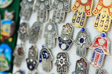 Souvenirs at Jerusalem bazaar, hamsa or khamsa symbol of Judaismの写真素材