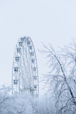Ferris wheel in winter parkの写真素材