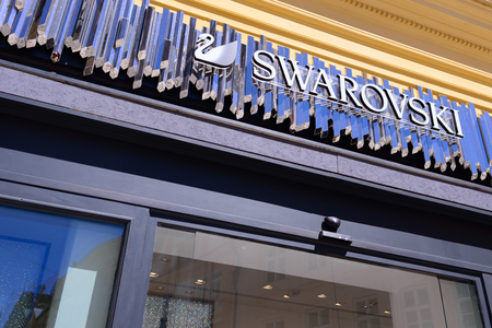 PRAGUE, CZECH REPUBLIC - MAY 2017: Logo Swarovski in Prague. Swarovski is an Austrian Crystal manufacturer produces crystal jewelry and accessories.のeditorial素材