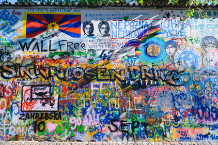 PRAGUE, CZECH REPUBLIC - MAY 2017: The Lennon Wall since the 1980s filled with John Lennon-inspired graffiti and pieces of lyrics from Beatles songs.のeditorial素材