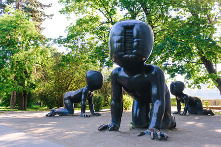 PRAGUE, CZECH REPUBLIC - MAY 2017: Three big bronze baby sculptures by Czech artist David Cerny. Park on the Kampa Island in Prague, Czech Republicのeditorial素材