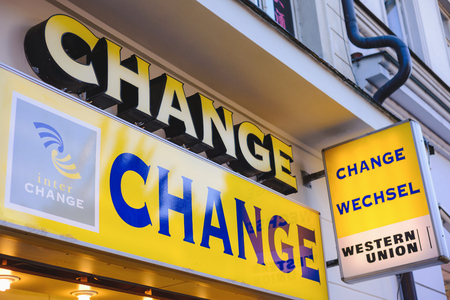 PRAGUE, CZECH REPUBLIC - MAY 2017: Travel currency exchange counter service. Money exchange shop in Prague for visitor and tourist. Currency exchange sign.のeditorial素材