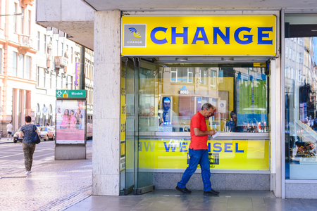PRAGUE, CZECH REPUBLIC - MAY 2017: Travel currency exchange counter service. Money exchange shop in Prague for visitor and tourist.のeditorial素材