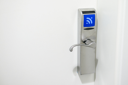 Hotel electronic lock on white doorのeditorial素材