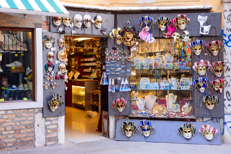 VENICE, ITALY - MAY, 2017: shop full of traditional masks and souvenirs in a small stree. During the Carnival people wear masks to conceal their identity.のeditorial素材