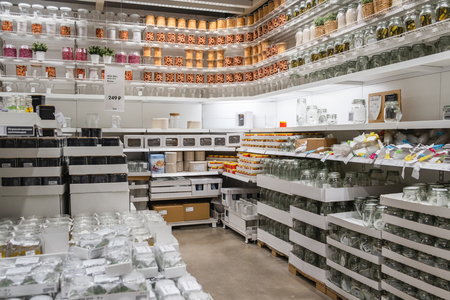 ST. PETERSBURG, RUSSIA - MARCH, 2019: Interior of elegant IKEA furniture store with tableware objects and other home decorations and other kitchen utensilsのeditorial素材