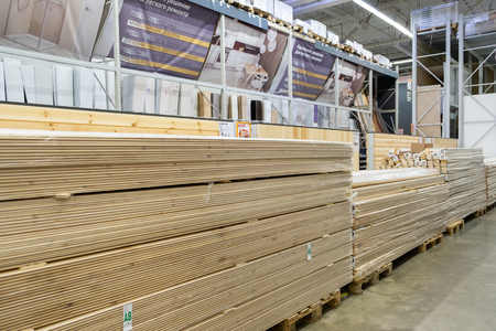 ST. PETERSBURG, RUSSIA - MARCH, 2019: Many wooden planks in hardware storeのeditorial素材