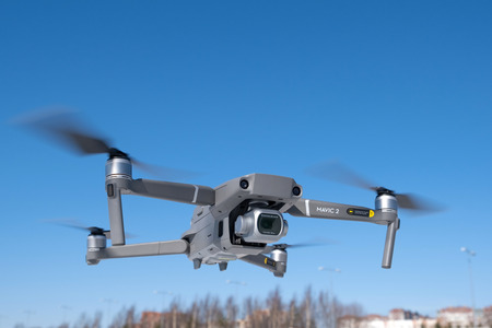 ST. PETERSBURG, RUSSIA - APRIL, 2019: DJI Mavic 2 pro with Hasselblad camera. Flight against blue skyのeditorial素材