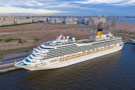 ST. PETERSBURG, RUSSIA - JUNE, 2019: Sea passenger berth. Sea liners. The best cruise line of the world. Cruise ships in the international port of St. Petersburg. Russia, port Sea Facadeのeditorial素材