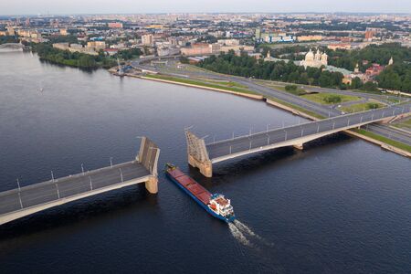 Saint Petersburg. Russia. Alexander Nevsky Bridge lifted. The drawbridges of Petersburg. Navigation on the Neva River. Cities of Russia. Panorama of St. Petersburg.の写真素材