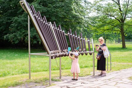 KRAKOW, POLAND - JUNE 17: Museum of Science in the open air. Park. Principle of sound device. STEM education. Back to school.のeditorial素材