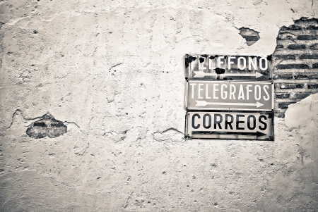 Vintage telephone, telegram, mail, plaque in Spanishの写真素材