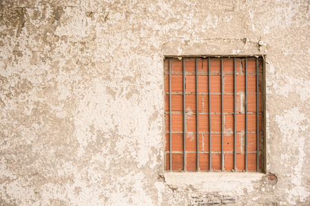 Window closed with bricksの写真素材