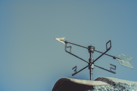 weathervane with arrowの写真素材