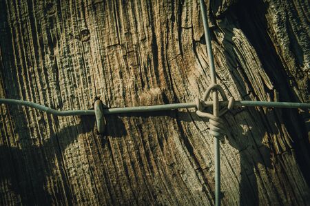 Fence post with wireの写真素材