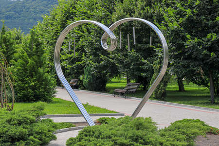 Heart shaped sculpture for all lovers. Inscription: to all lovers. Russia, Krasnodar region, Novorossiysk district, Abrau-Durso village, July 19, 2019のeditorial素材