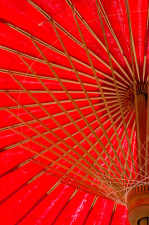 north thailand traditional red umbrella from ant eye viweの写真素材