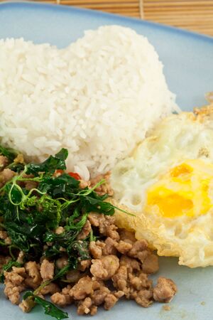 Thai spicy food, stir fried pork whit basilの写真素材