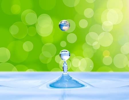 close up failing water dropの写真素材