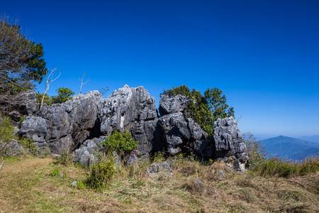 big rock on the blue sky backgroundの写真素材