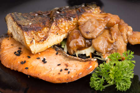 fish grilled with sauceの写真素材