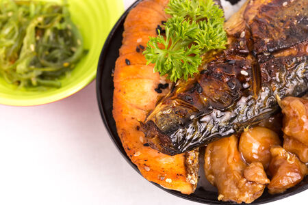 fish grilled with sauceの写真素材