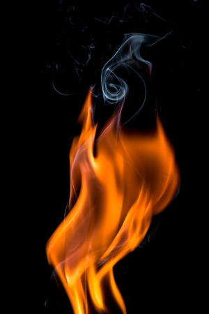 fire flame on dark backgroundの写真素材