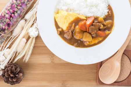 close up of curry pork and omelette with riceの写真素材