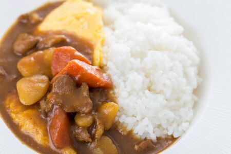 close up of curry pork and omelette with riceの写真素材