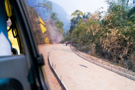 Difficult road construction in rural area of Thailand in high mountain