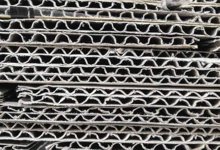 Stack of used brown corrugated cardboard sheetの写真素材