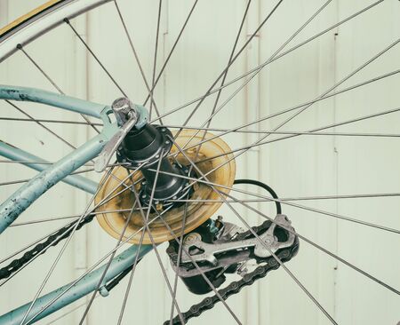 Part of old bicycle wheel, derailleur, and chain (vintage effect)の写真素材