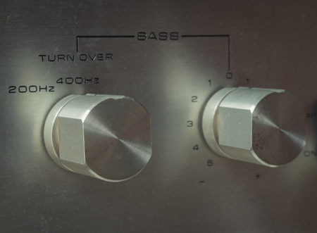 Old bass sound control buttons of retro audio in vintage effectの写真素材