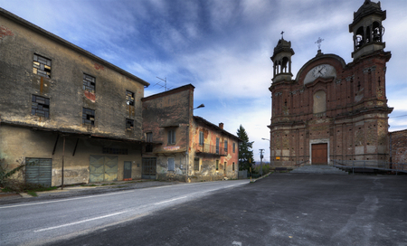 Langhe, Surie of Clavesna, a gosth town in Italy. - Surie of Clavesana where you can still see the signs of a bar, a restaurant and a mechanic workshop completely abandoned.の写真素材