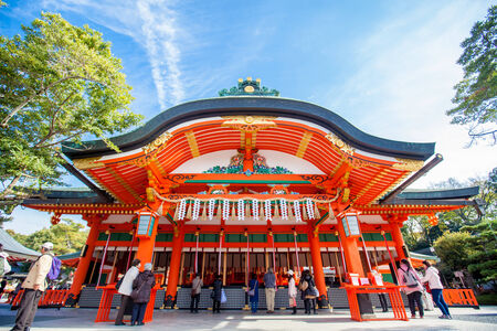 KYOTO, JAPAN - NOV 28 : Tourists at Fushimi Inari Shrine on November 28 2012. The shrine is famous for its torii gates walkway that lead to the top of the mountain.のeditorial素材