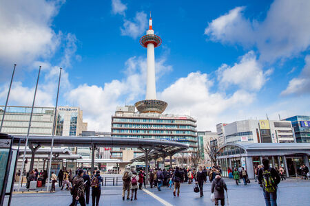 KYOTO, JAPAN - NOV 27: Kyoto Tower and Kyoto Tower Hotel viewed from Kyoto station bus terminal on 27 November 2012. The tower has a 100m high observation deck with 360 degree views of the city.のeditorial素材